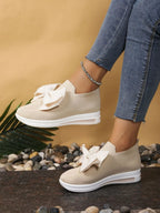 Bow-Tie Knit Slip-On Sneakers